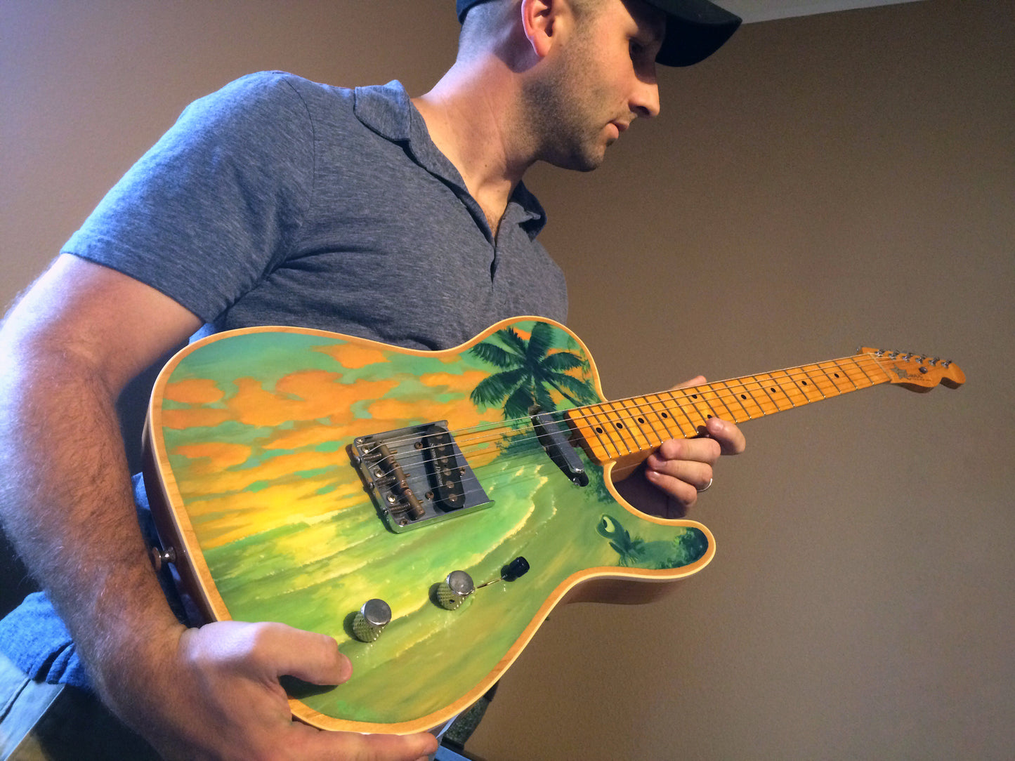 Hand painted electric guitar featuring Beau